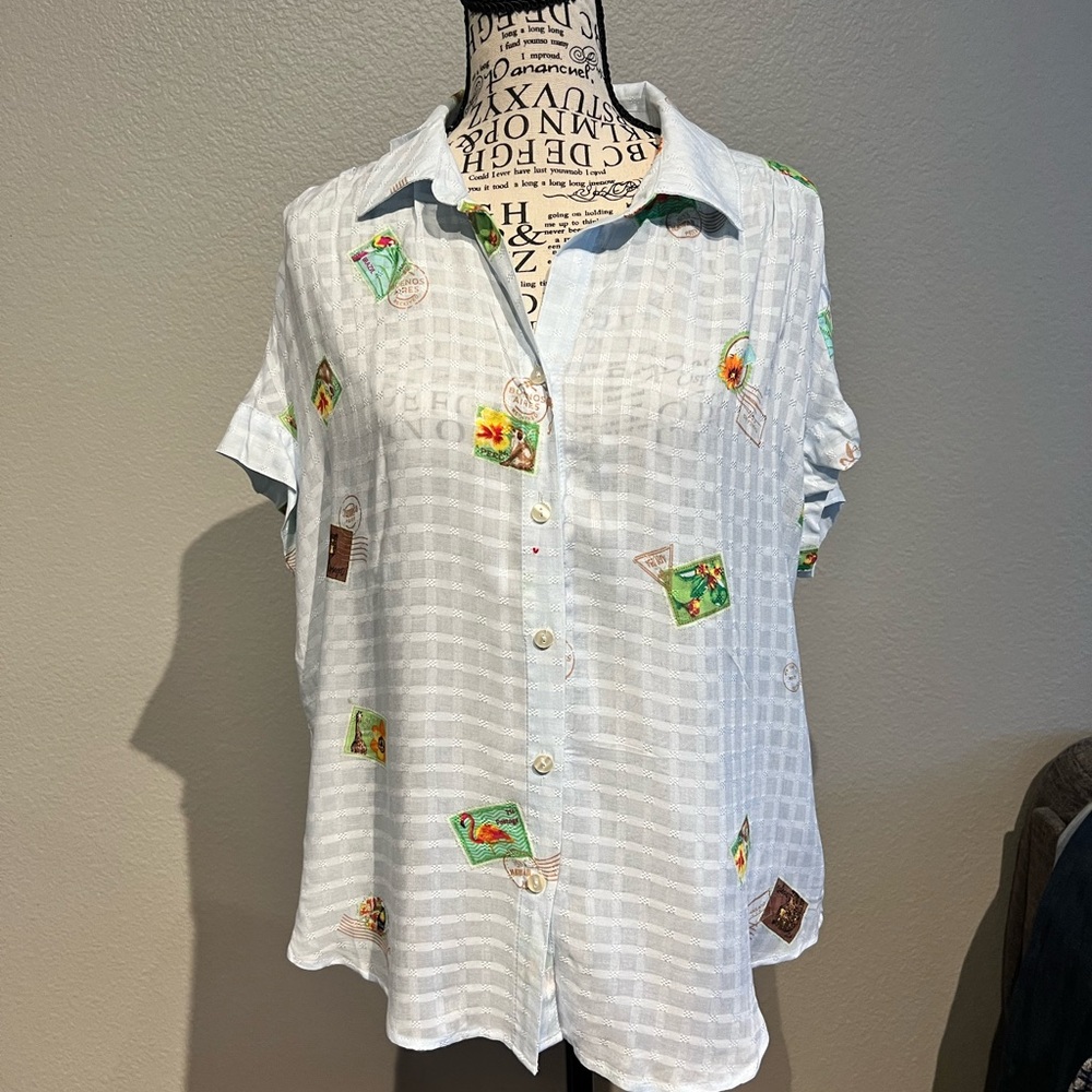 Light Blue Button-Up Shirt with Graphic Patches